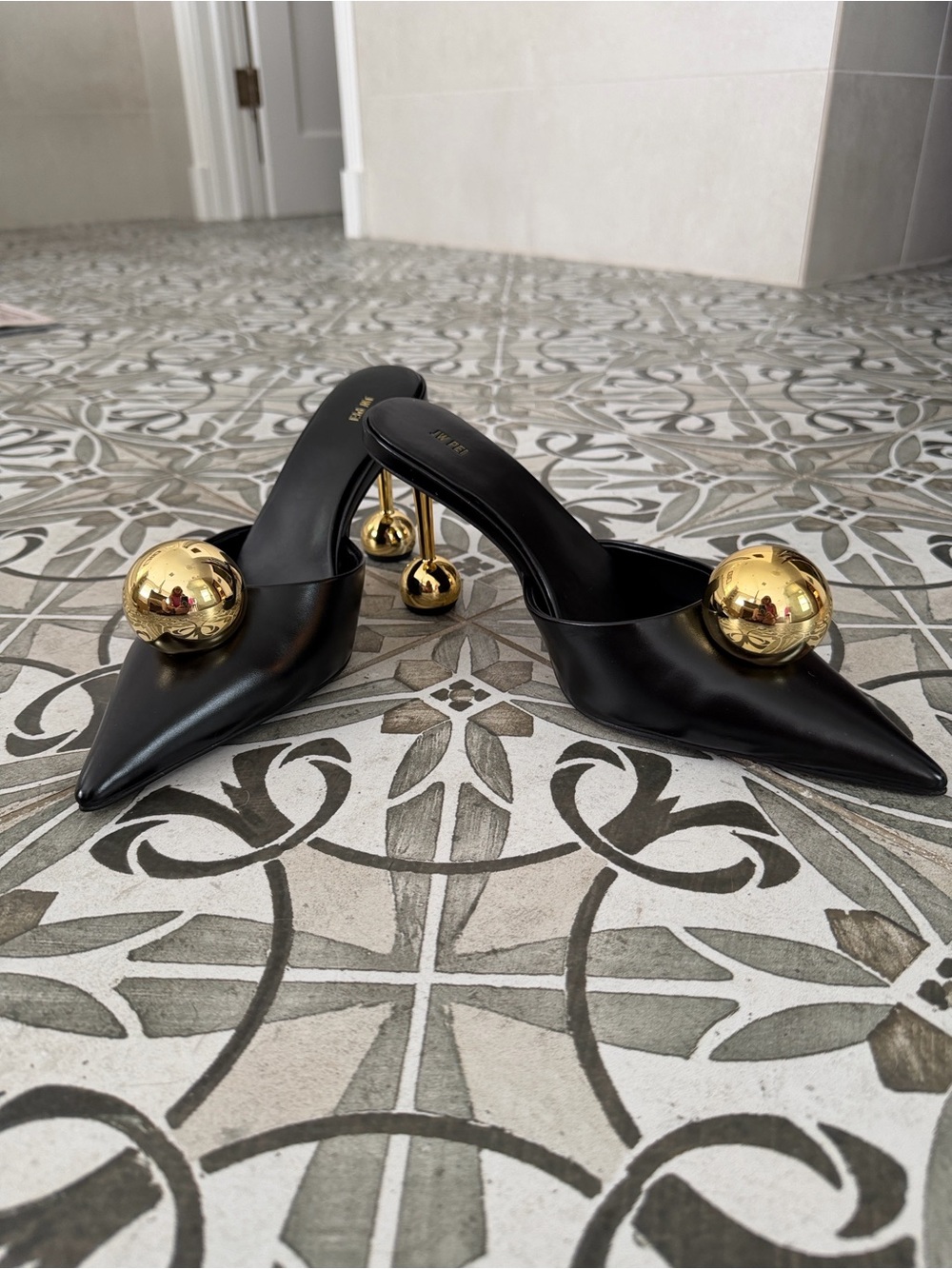 JW PEI Black Leather Pointed Mule Heels with Gold Orb Accents